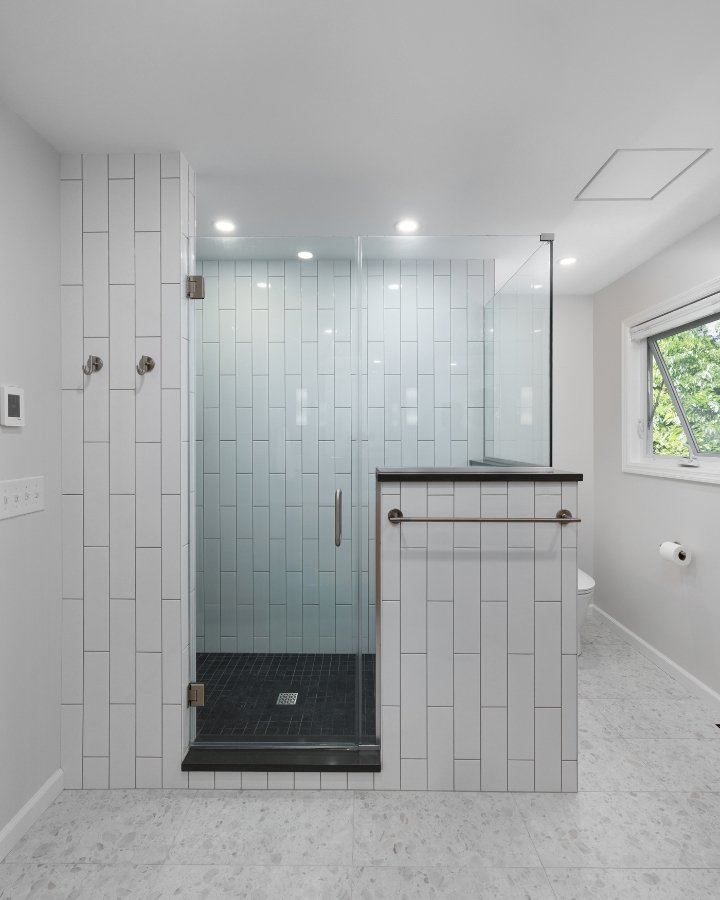 Frameless Glass Shower with White Subway Tile