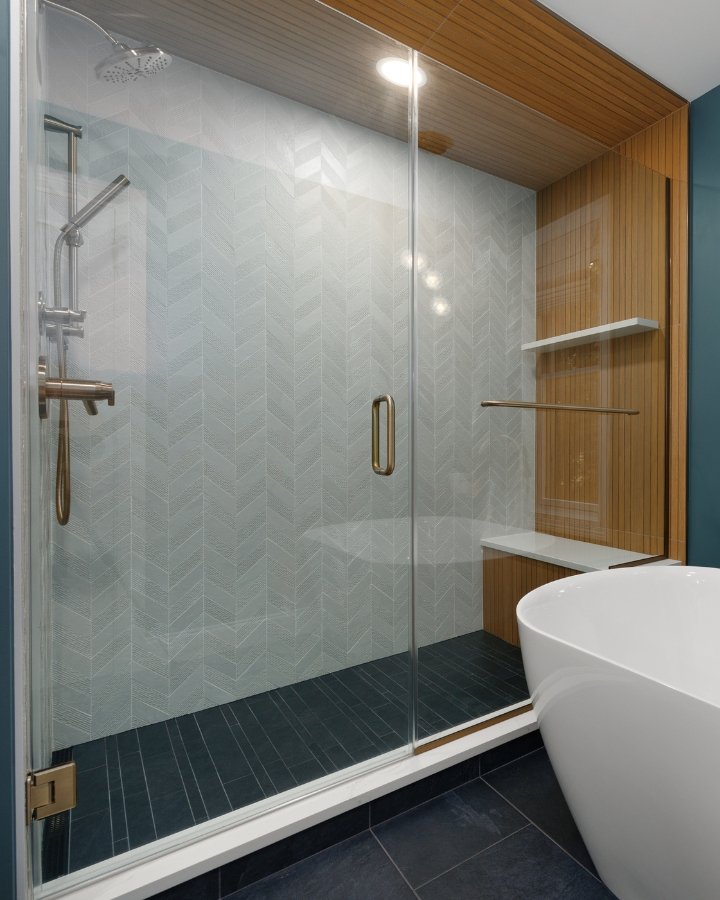 Frameless Glass Shower with Wood Accent Wall